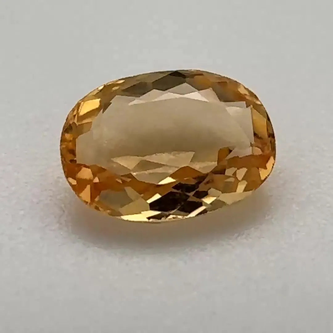 1.21ct Oval Natural Topaz (Colour Orange, Clarity Eye Clean, Cut Faceted)