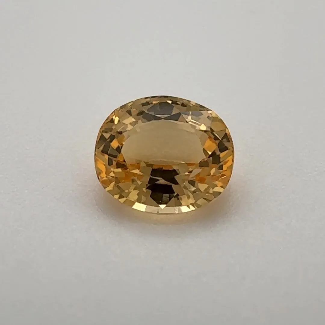 1.46ct Oval Natural Topaz (Colour Orange, Clarity Eye Clean, Cut Faceted)